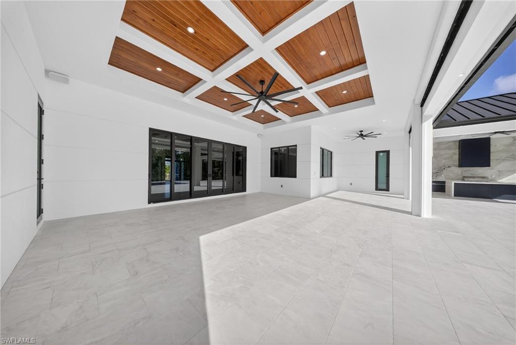 1874 39th Street Southwest Naples, FL 34117 - Photo 37 of 50 a view of an entryway with wooden floor