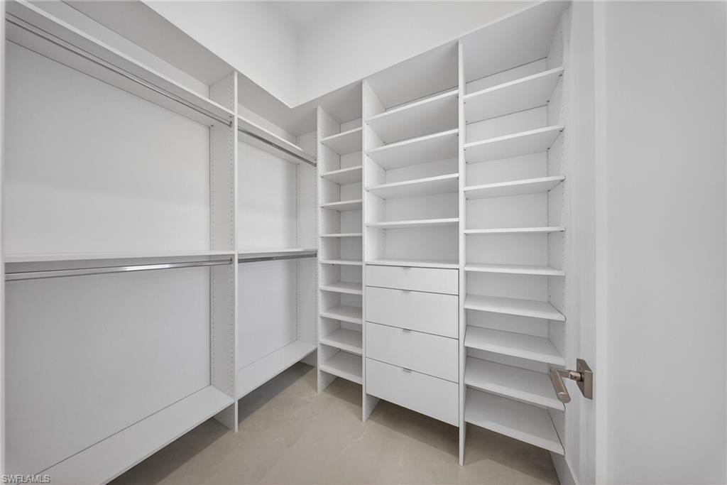 1874 39th Street Southwest Naples, FL 34117 - Photo 46 of 50 a view of an empty walk in closet