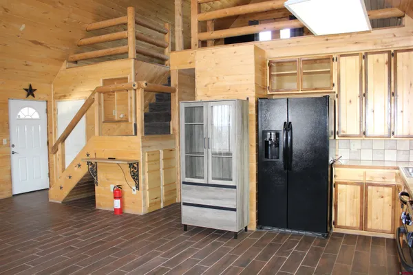 a view of a refrigerator in the house