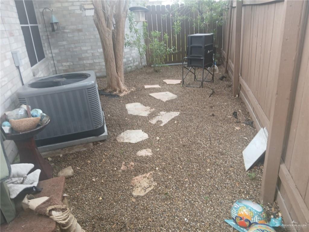 6700 North 8th Street McAllen, TX 78504 - Photo 13 of 16 a view of a chair and fire pit in patio
