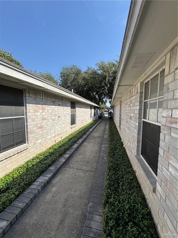 6700 North 8th Street McAllen, TX 78504 - Photo 15 of 16 a view of a house with a yard