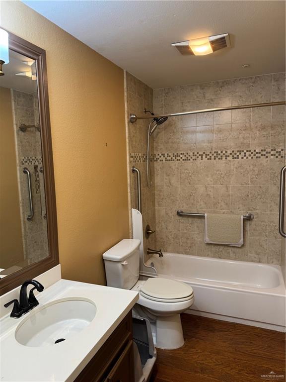 6700 North 8th Street McAllen, TX 78504 - Photo 6 of 16 a bathroom with a sink a toilet and shower