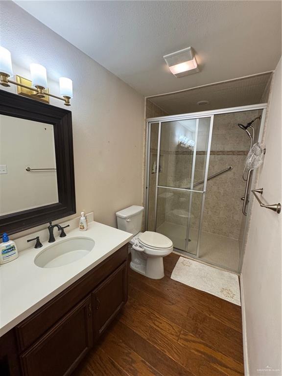 6700 North 8th Street McAllen, TX 78504 - Photo 8 of 16 a bathroom with a sink and a mirror