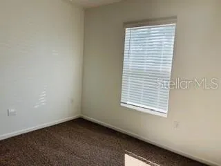 an empty room with a window