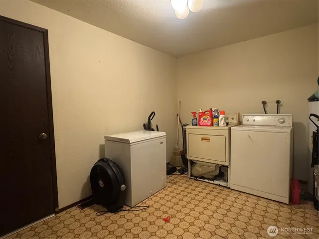 a storage room with a washer and dryer