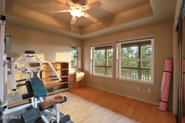 a utility room with cabinets washer and dryer