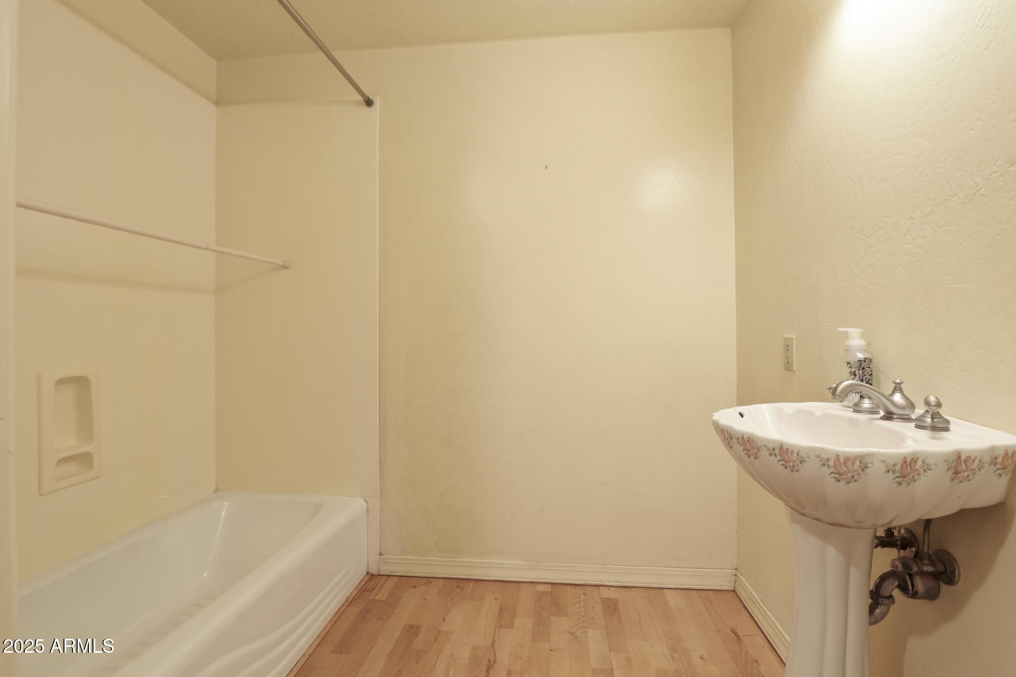 131 West Hunt Ranch Road Pine, AZ 85544 - Photo 19 of 65 a bathroom with a sink a bathtub and a shower