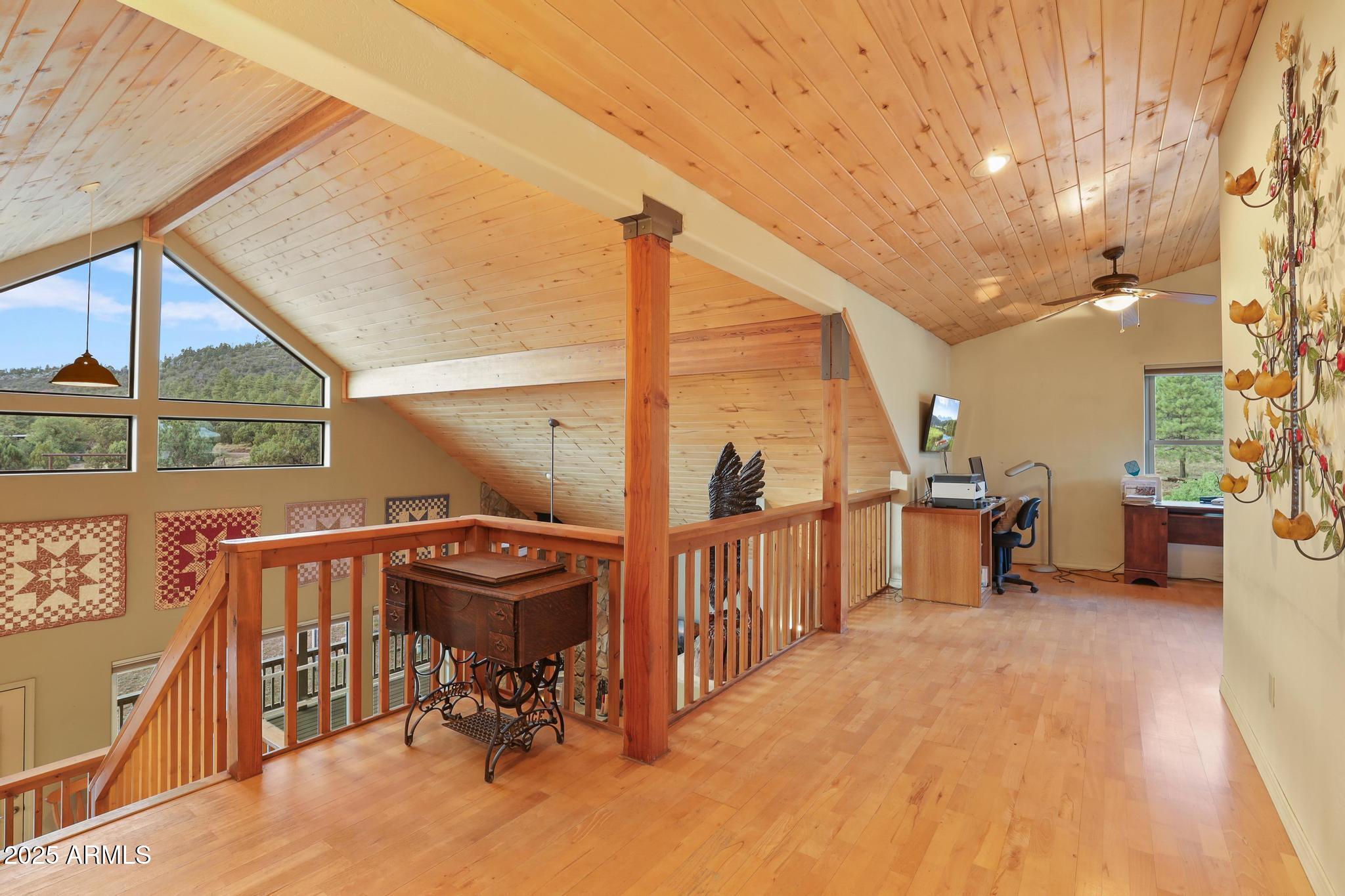 131 West Hunt Ranch Road Pine, AZ 85544 - Photo 20 of 65 a view of a chairs and table in the balcony