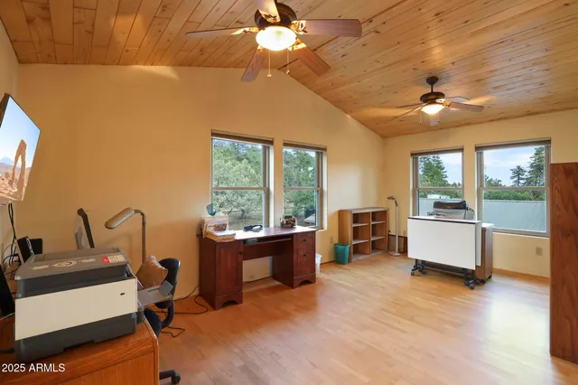 a bedroom with a bed and a fireplace
