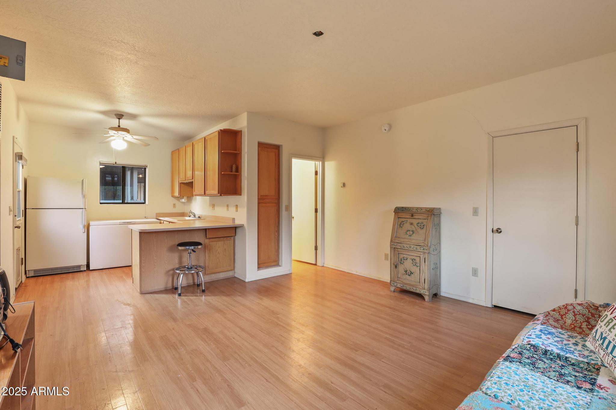 131 West Hunt Ranch Road Pine, AZ 85544 - Photo 30 of 65 a view of a kitchen cabinets and wooden floor