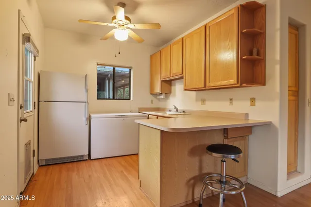 a view of a house with a yard and garage