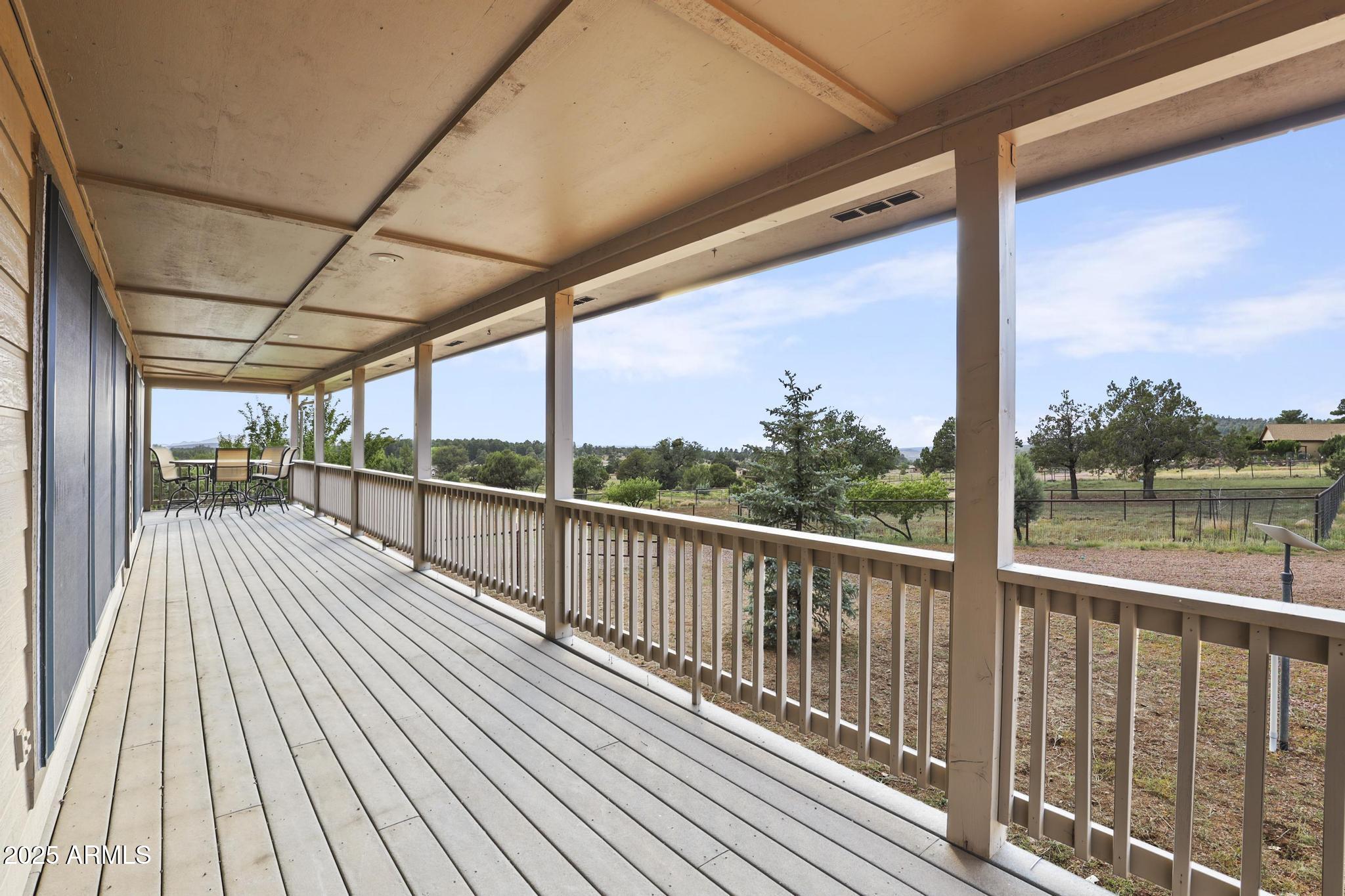 131 West Hunt Ranch Road Pine, AZ 85544 - Photo 4 of 65 a view of a balcony with wooden floor