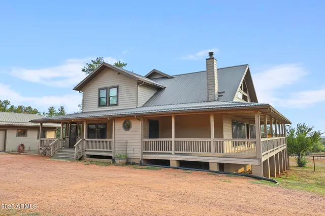 a front view of a house with a porch