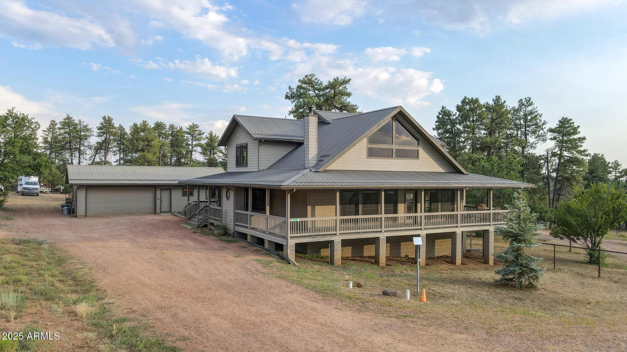 131 West Hunt Ranch Road Pine, AZ 85544 - Photo 59 of 65 front view of a house with a yard