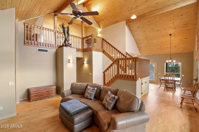 a large kitchen with a table and chairs