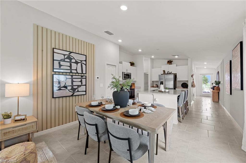 7178 Sugar Pine Way Fort Myers, FL 33966 - Photo 9 of 33 a dining room with furniture and window