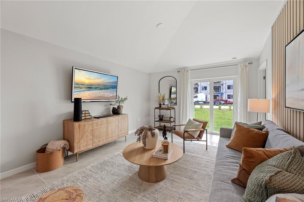 7178 Sugar Pine Way Fort Myers, FL 33966 - Photo 11 of 33 a living room with furniture and a flat screen tv