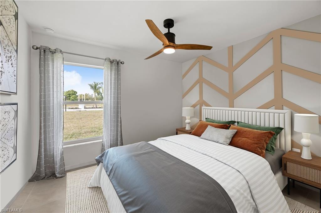 7178 Sugar Pine Way Fort Myers, FL 33966 - Photo 19 of 33 a bedroom with a bed and a window