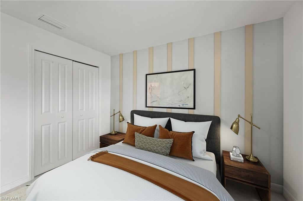 7178 Sugar Pine Way Fort Myers, FL 33966 - Photo 20 of 33 a bedroom with a bed and a painting on the wall