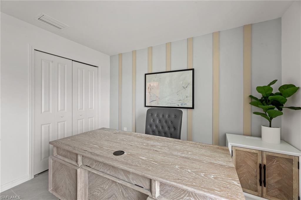 7178 Sugar Pine Way Fort Myers, FL 33966 - Photo 24 of 33 a bedroom with a bed and a potted plant