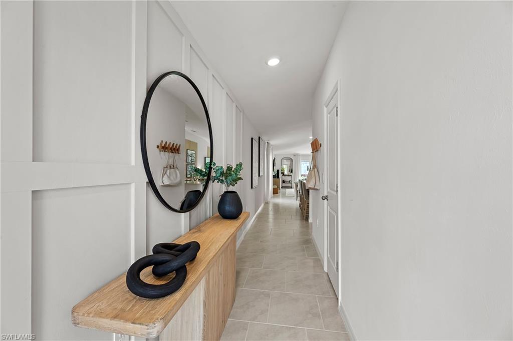 7178 Sugar Pine Way Fort Myers, FL 33966 - Photo 3 of 33 a view of a entryway door with wooden floor