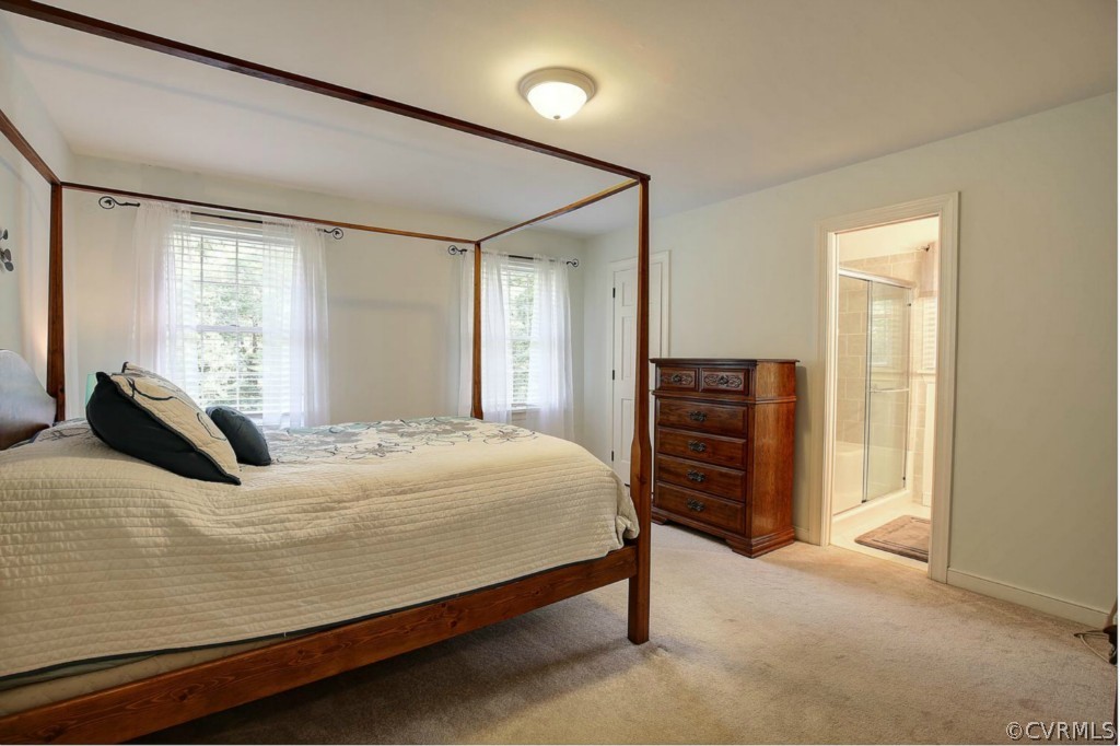 2811 Queenswood Road Midlothian, VA 23113 - Photo 14 of 24 a bedroom with a bed and a dresser