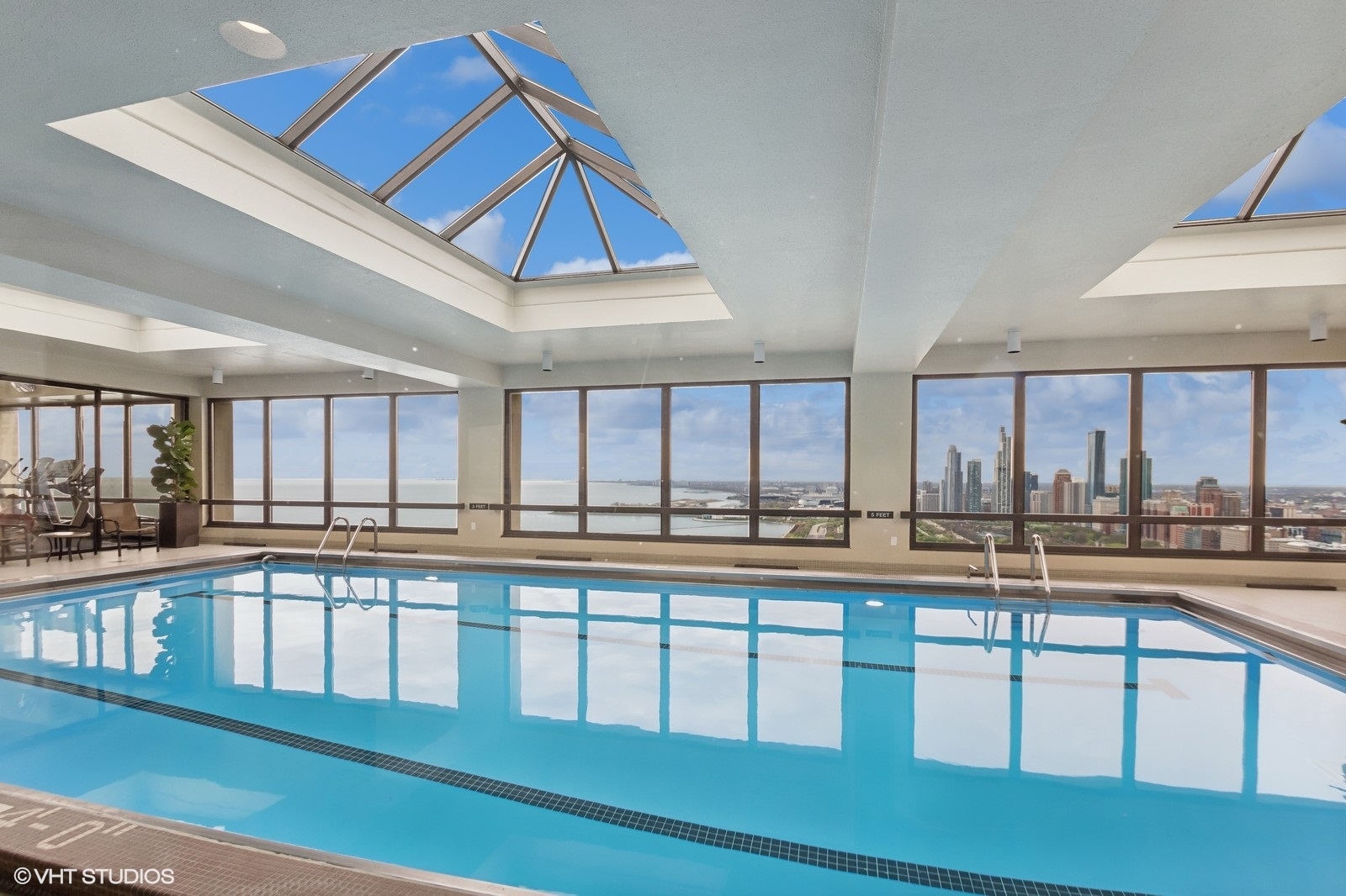 Undisclosed Address Chicago, IL 60601 - Photo 11 of 19 a view of a kitchen with a kitchen counter top and a view of living room