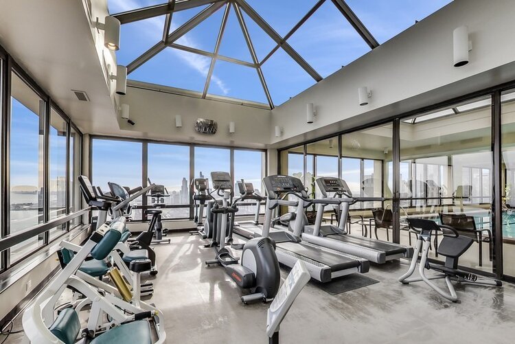 Undisclosed Address Chicago, IL 60601 - Photo 12 of 19 a view of a room with gym equipment