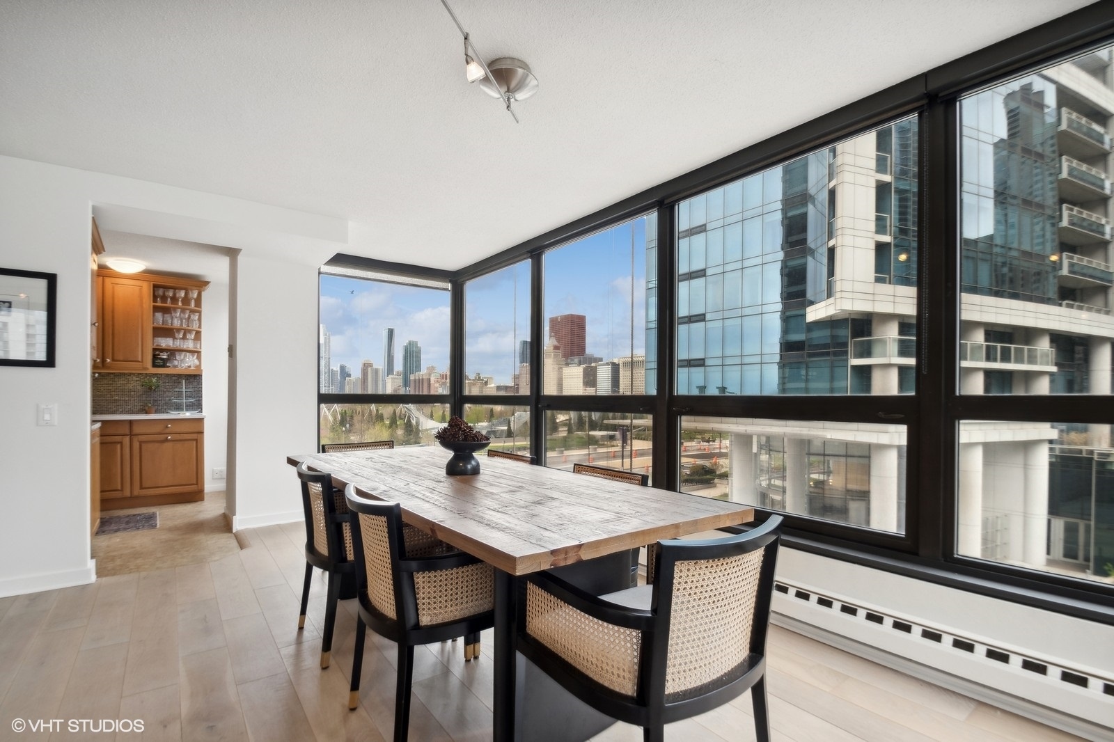 Undisclosed Address Chicago, IL 60601 - Photo 4 of 19 a view of a dining room with furniture window and wooden floor