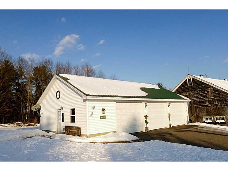 1128 River Road Livermore, ME 04253 - Photo 23 of 35 Parking Lot/Garage. The 3-bay garage...
