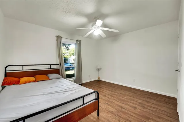 a room with furniture and wooden floor