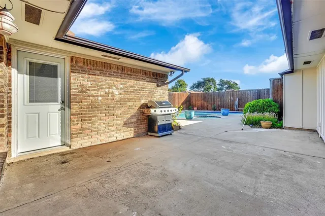 a view of a house with a swimming pool