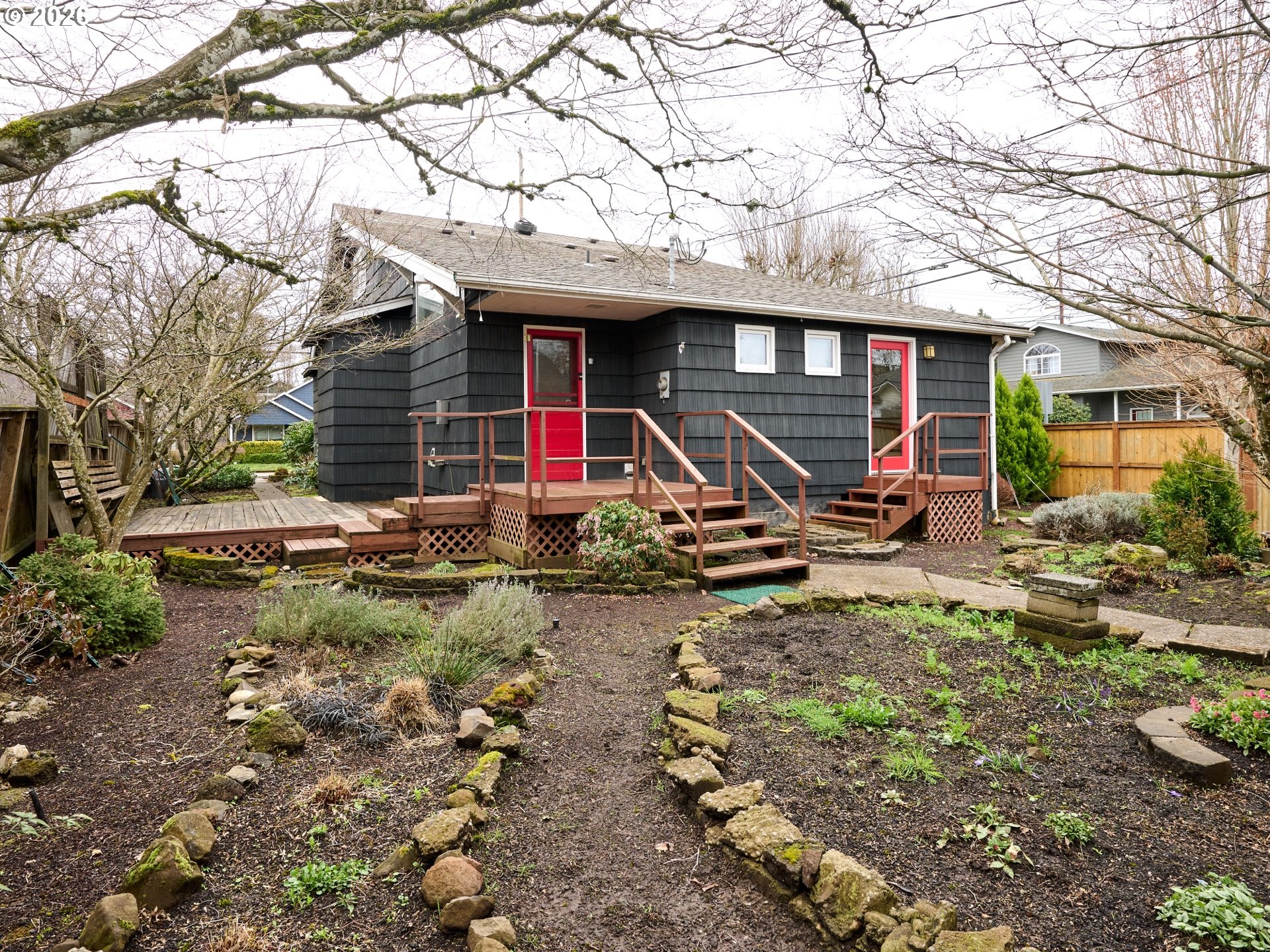 216 South James Street Silverton, OR 97381 - Photo 24 of 31 a view of a house with large trees and a yard
