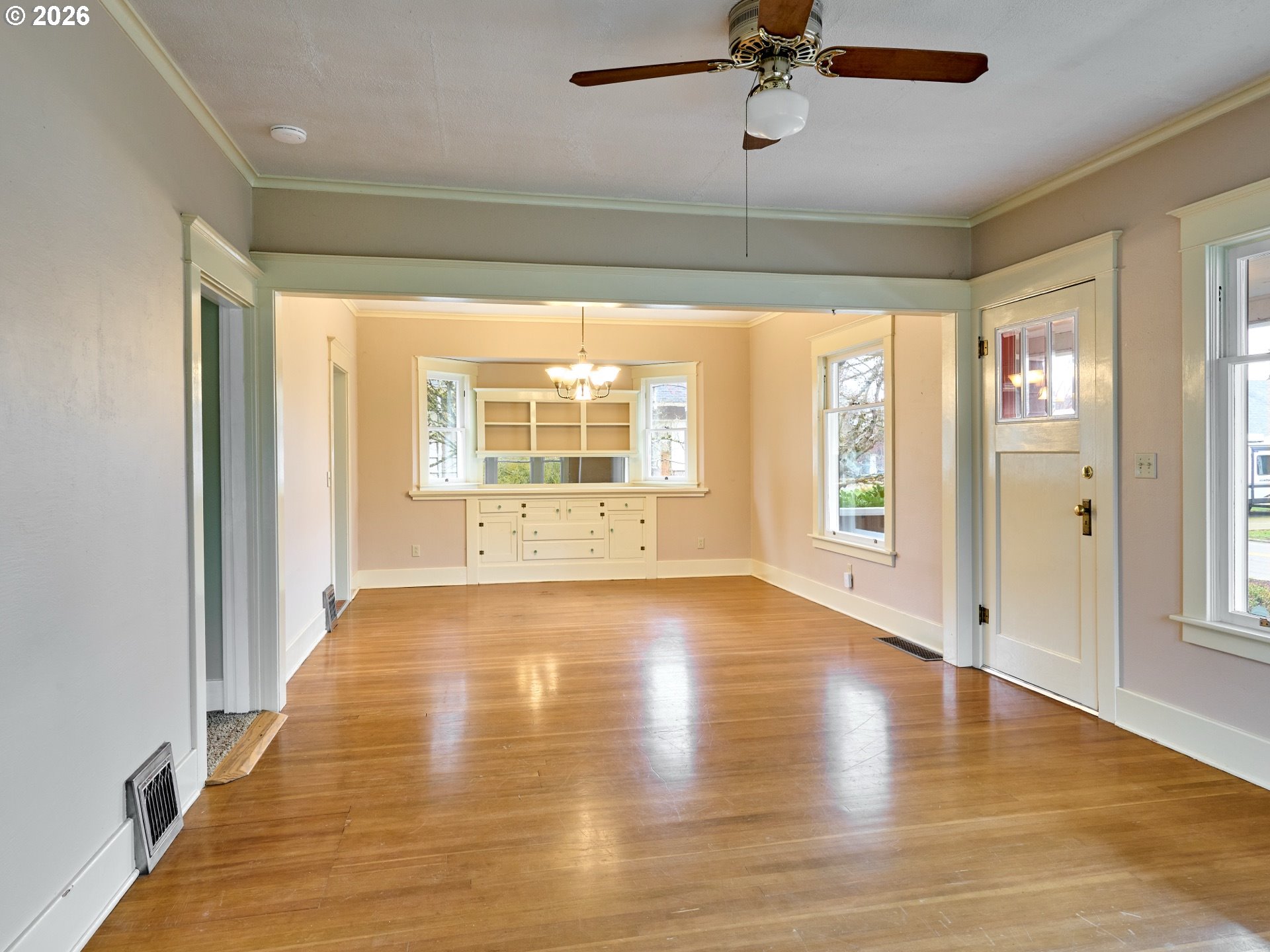 216 South James Street Silverton, OR 97381 - Photo 4 of 31 a view of an empty room with a window and wooden floor