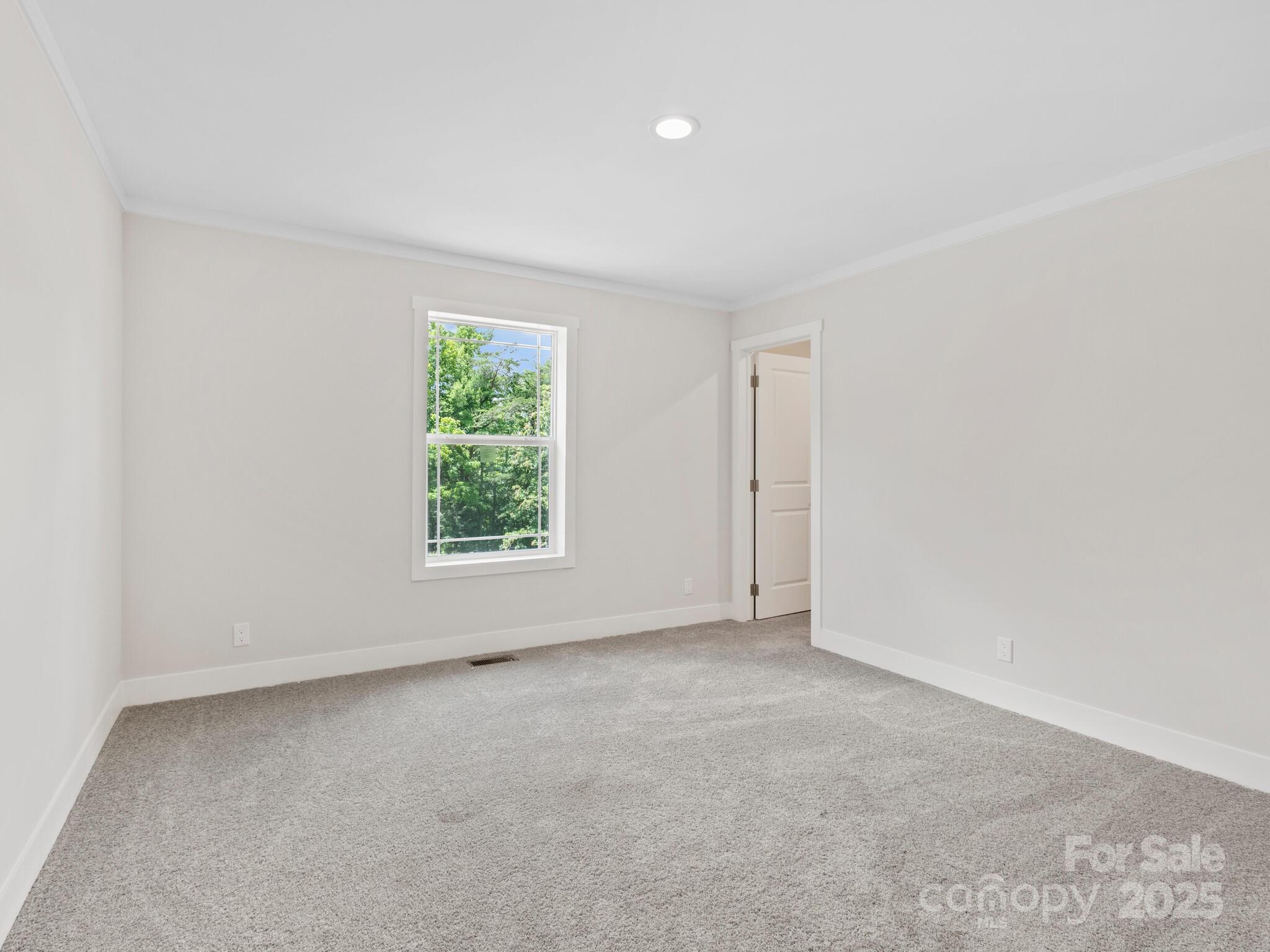 206 Walnut Br Road Weaverville, NC 28787 - Photo 10 of 18 an empty room with windows