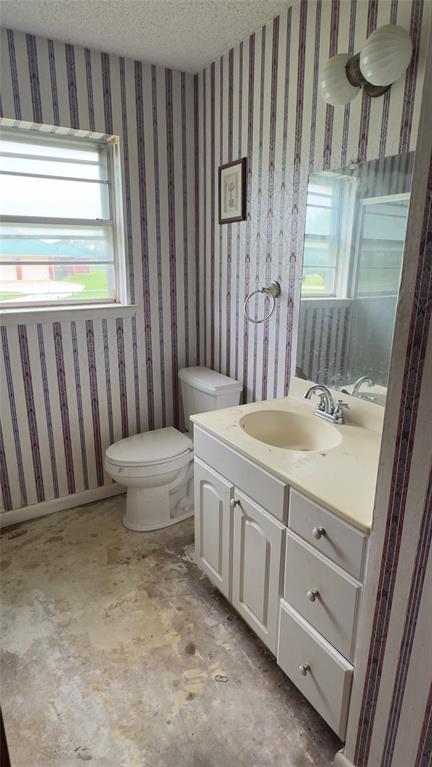 415 Meadowlark Trail Springtown, TX 76082 - Photo 18 of 35 a bathroom with a granite countertop sink and a mirror
