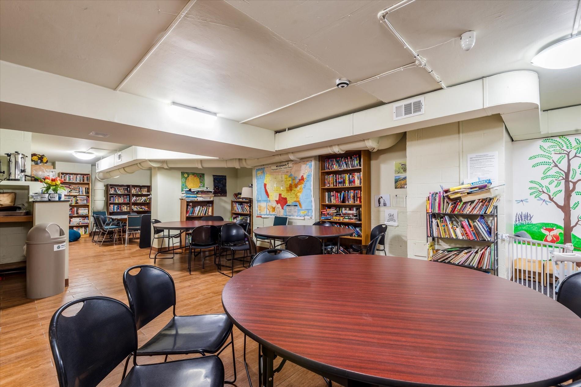 102-30 66th Road, Unit 4B Queens, NY 11375 - Photo 25 of 26 a dining room with lots of furniture and wooden floor