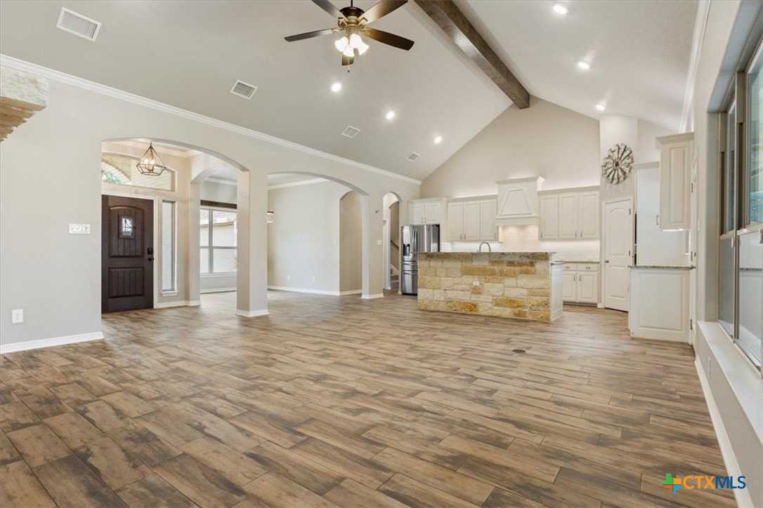 4 Salta Court Belton, TX 76513 - Photo 19 of 45 a view of a kitchen with a refrigerator and a fireplace