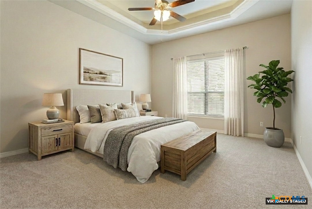 4 Salta Court Belton, TX 76513 - Photo 24 of 45 a spacious bedroom that has a bed and a chandelier