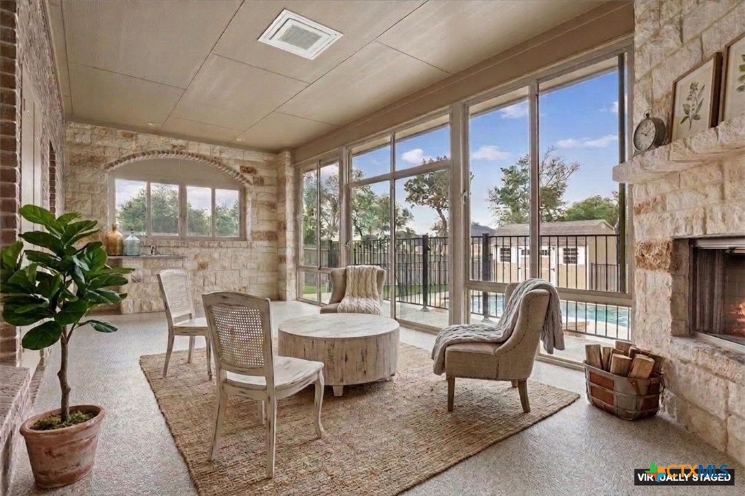 4 Salta Court Belton, TX 76513 - Photo 3 of 45 a dining room with furniture a chandelier and glass door