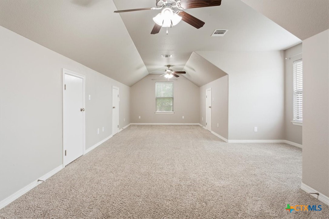 4 Salta Court Belton, TX 76513 - Photo 40 of 45 a view of an empty room with a chandelier fan