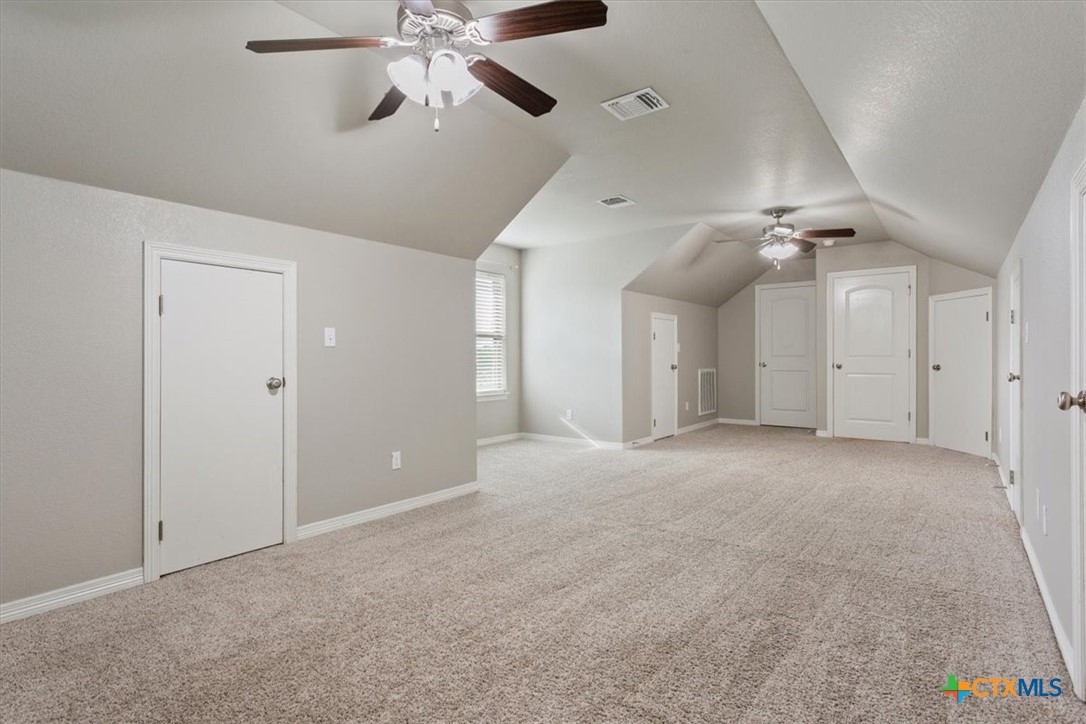 4 Salta Court Belton, TX 76513 - Photo 41 of 45 a view of a big room with a ceiling fan and entryway