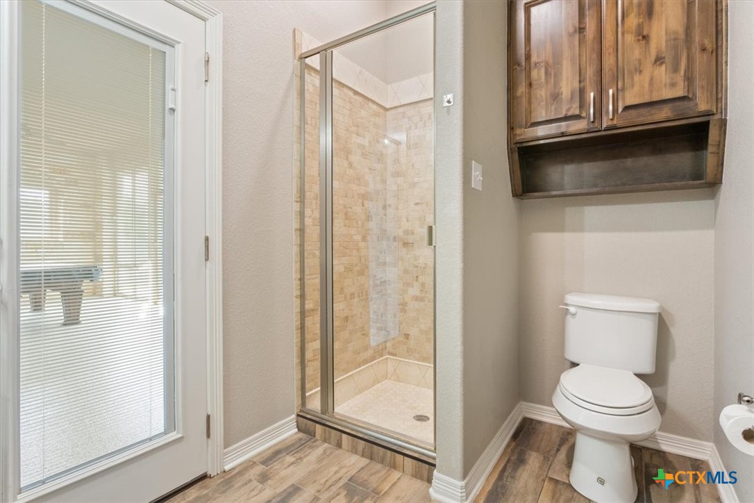 4 Salta Court Belton, TX 76513 - Photo 43 of 45 a bathroom with a toilet a sink and shower