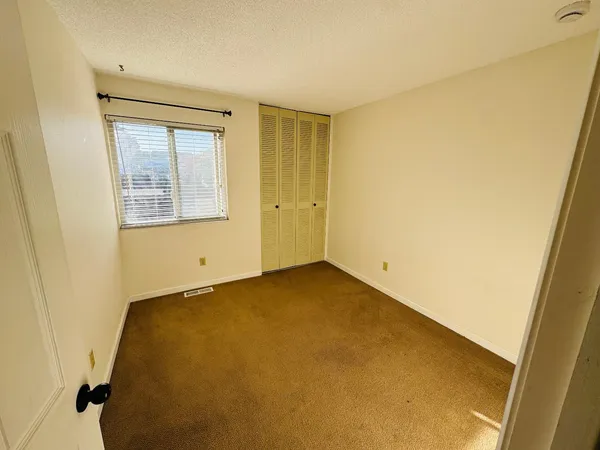 a view of a room with a window