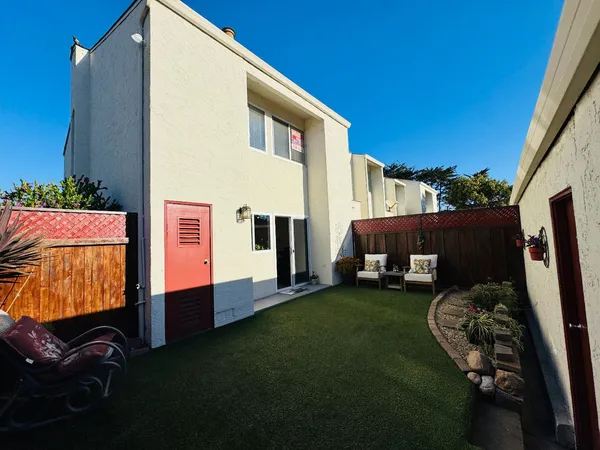 a view of backyard with furniture