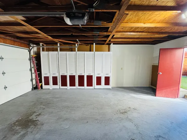 a view of a room with lots of windows