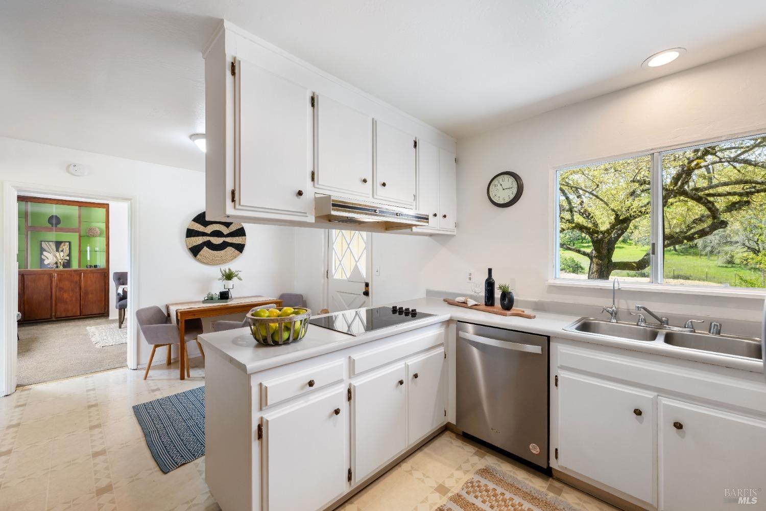 12600 Henno Road Glen Ellen, CA 95442 - Photo 15 of 45 a kitchen with a sink cabinets and window