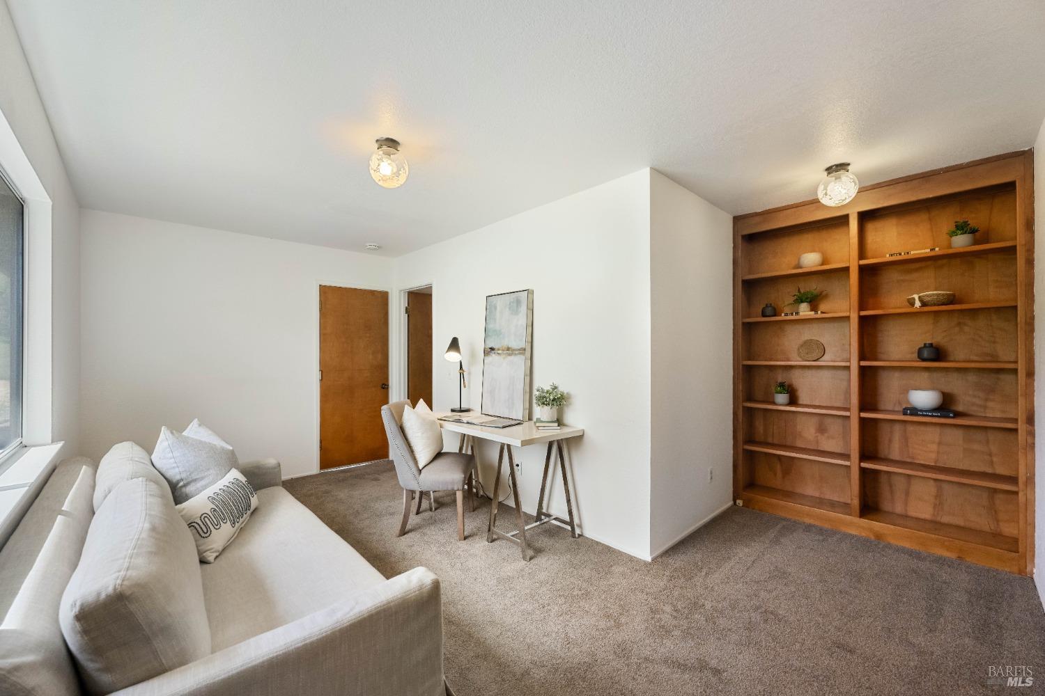 12600 Henno Road Glen Ellen, CA 95442 - Photo 28 of 45 a view of a livingroom with furniture and staircase