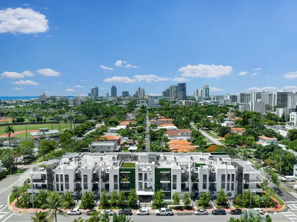 a view of city with tall buildings