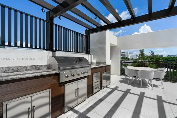 a view of outdoor space with seating area